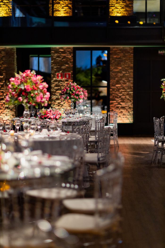 who-we-are A luxurious dining room setting with elegant floral arrangements and ambient lighting. Ideal for upscale events.