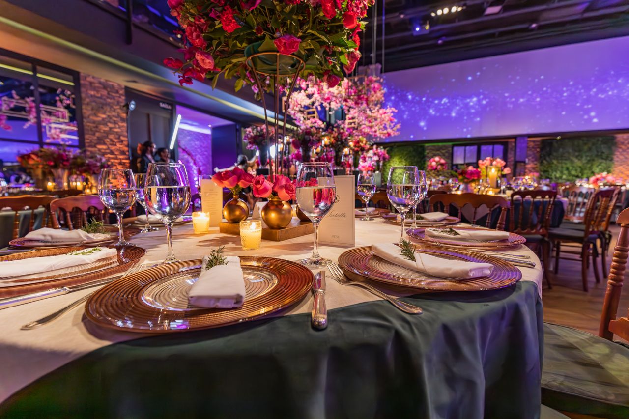 about-bg Luxurious table setting with flowers and candles, perfect for an elegant banquet or celebration.